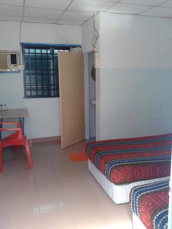Et Budget Guest House Batu Feringgi Rum bild